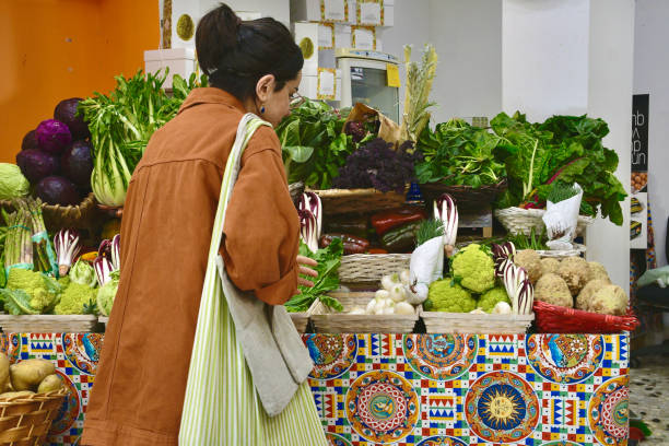 istock Girl at grocery store 2084055832