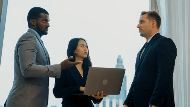 istock Diversity business people in ornamented office discussing business plan 2084117722