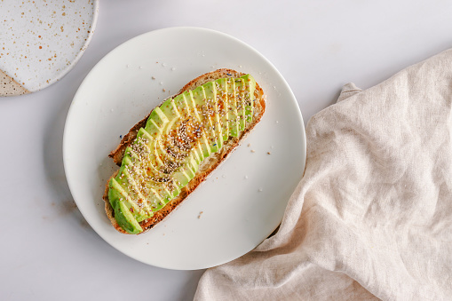 Toasted bread with sliced avocado