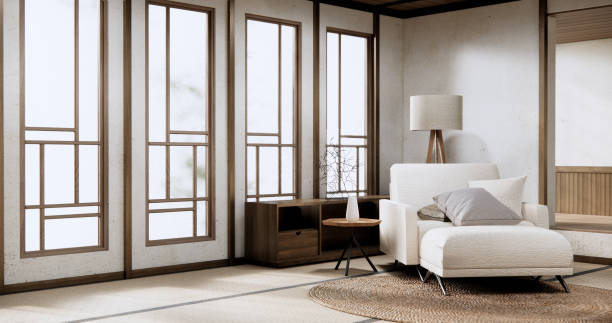 istock Sofa armchair in japanese living room with empty wall. 2084149362