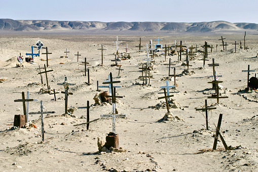 Nazca, Peru.  May 22nd 2006.  A cemetery in the desert on the outskirts of Nazca, Peru.