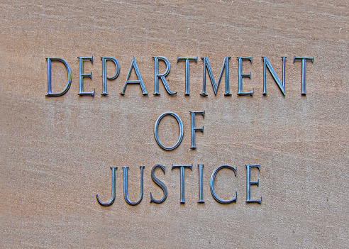 The Department of Justice building in Washington DC, also known as Justice Department. The Federal organization responsible for the enforcement of the law in United State.