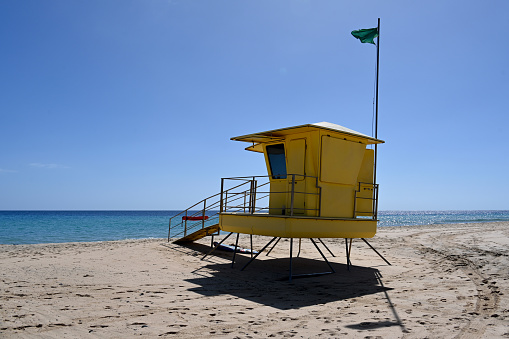 Morro Jable, Fuerteventura, Canary Islands, Spain, February 11, 2024 - Lifeguard tower on the beach of Jandia / Matorral Beach, Fuerteventura, Spain.