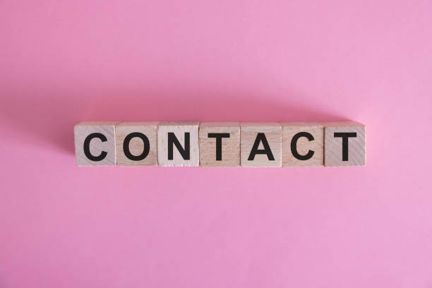 istock CONTACT word background on wood blocks. 2084313032