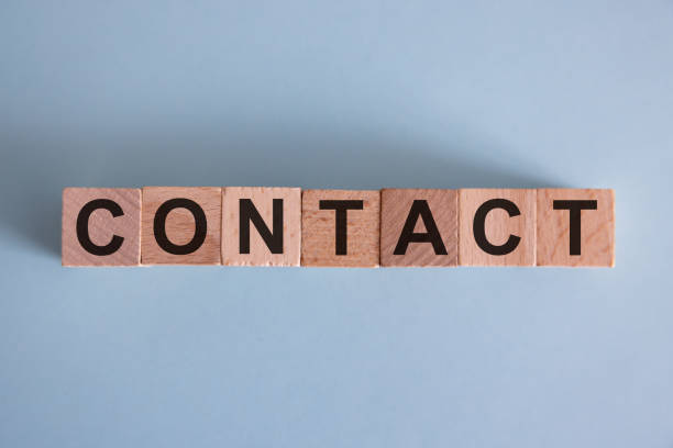 istock CONTACT word background on wood blocks. 2084313038