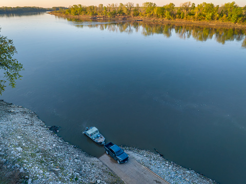 launching a fishing boat at a ramp - sunrise aerial view of Missouri River at Dalton Bottom