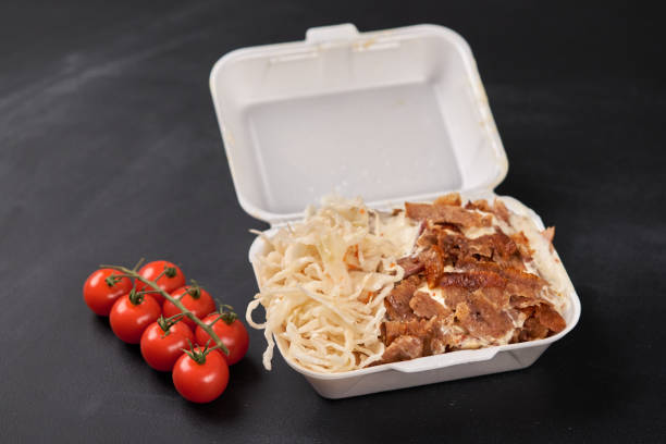 istock Doner kebab with salad in a plastic box. 2084349487