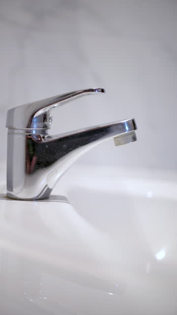 Faucet in the bathroom at home