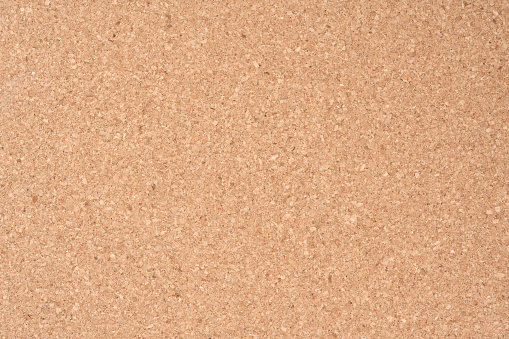 Brown cork board as background.