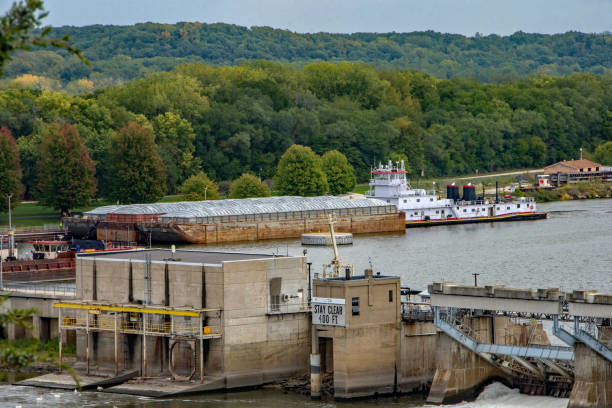 istock Starved Rock SP - Barge & Towboat Enter Lock on Illinois River 2084414255
