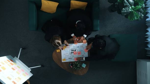 istock Top view of businesswoman write idea on stick notes while standing. Directorate. 2084520418