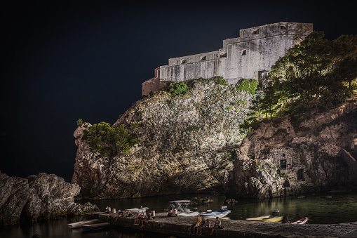 Night view of Fort Lovrijenac, which sits dramatically atop a cliff near Dubrovnik Old Town, Croatia