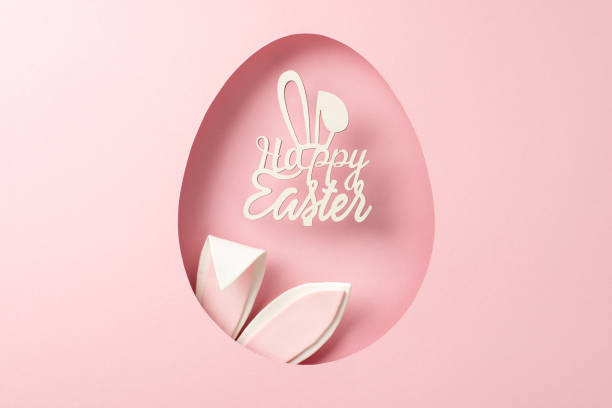 Easter-themed art showcasing playful bunny ears peeking through an egg-shaped cutout, adorned with a arte con temática de pascua que muestra juguetonas orejas de conejo que se asoman a través de un recorte en forma de huevo, adornado con un mensaje de
