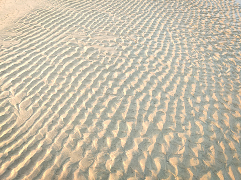 Natural patterns on beach sand abstract