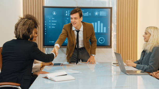 istock Ornament meeting room, business people hand shaking together 2084577708