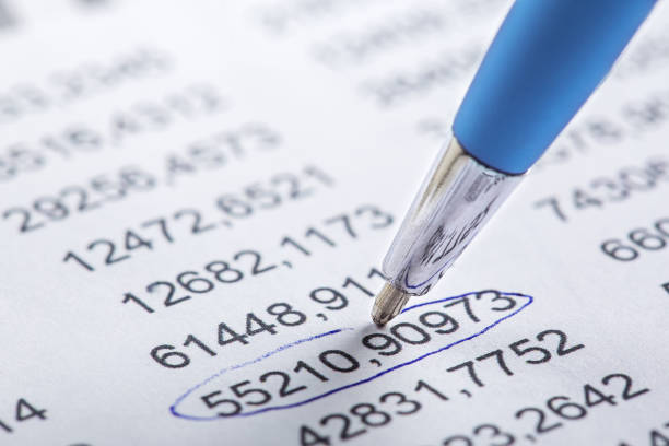 istock Accounting document with pen, share listing and checking financial chart. Concept of banking, financial report and financial audit. 2084579834