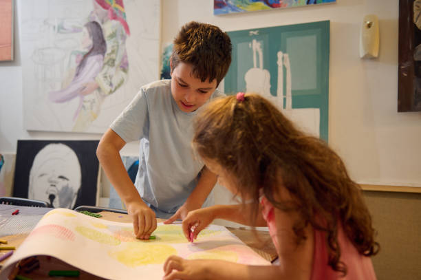 istock Caucasian inspired kids learning art, drawing with pencils in workshop. People, lifestyle, hobbies and leisure activity 2084598084