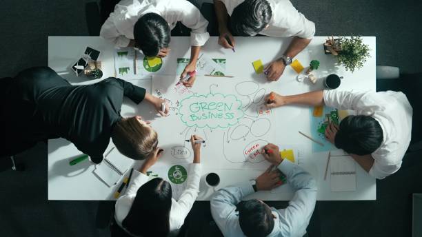istock Top down view of business team discuss about using clean energy. Alimentation. 2084610242