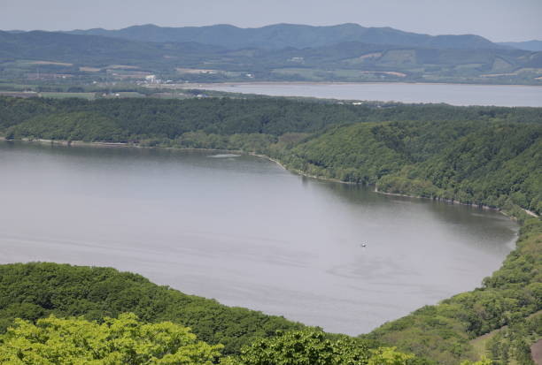 High angle view from Tentozan of land and water in Shari District. Spring morning in Okhotsk Subprefecture.