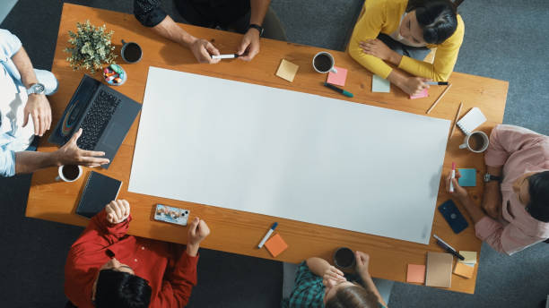 istock Top view of group walking at boardroom and brainstorming idea. Convocation. 2084726812