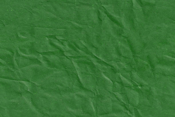 istock Seamless battered dark green craft paper texture. Brown spotted abstract material. 2084733643