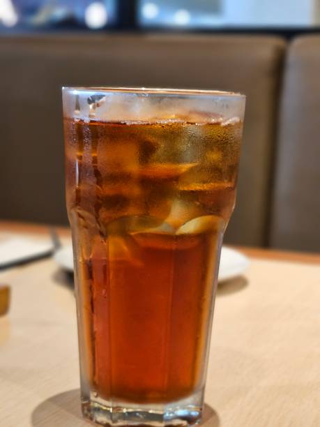 a glass of iced lemon tea on the table