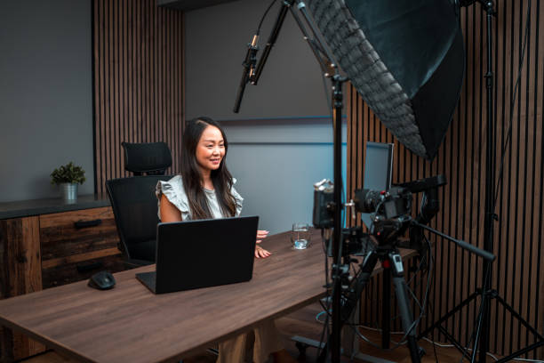 istock Confident Asian Female Creator in Action 2084864623