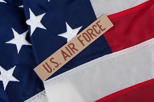 US AIR FORCE branch tape on USA national flag background