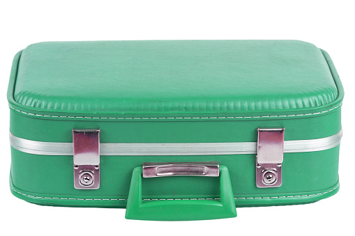 green suitcase isolated on white background.