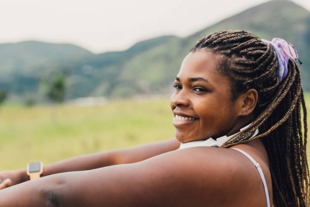 istock Plus size woman stretching outdoors 2084881702
