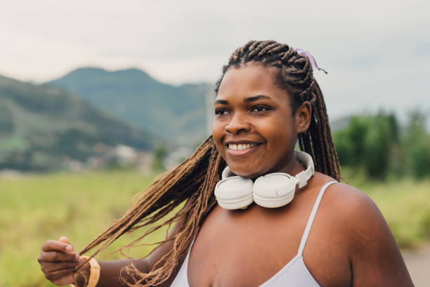 istock Plus size woman enjoying walk outdoors 2084882207