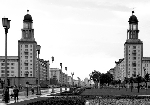 Boulevard Stalinallee at Frankfurter Tor. in East Berlin with residential buildings in the Soviet-inspired confectionery style - German Democratic Republic