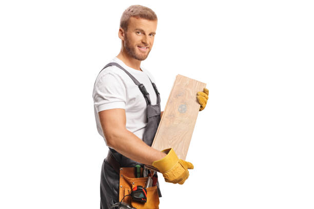 istock Worker holding a wooden beam 2084979833