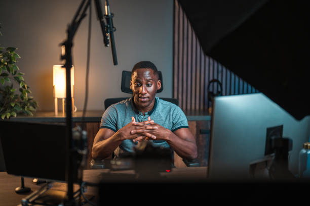 istock Black Male Creator Engaging Social Media Content 2084985770