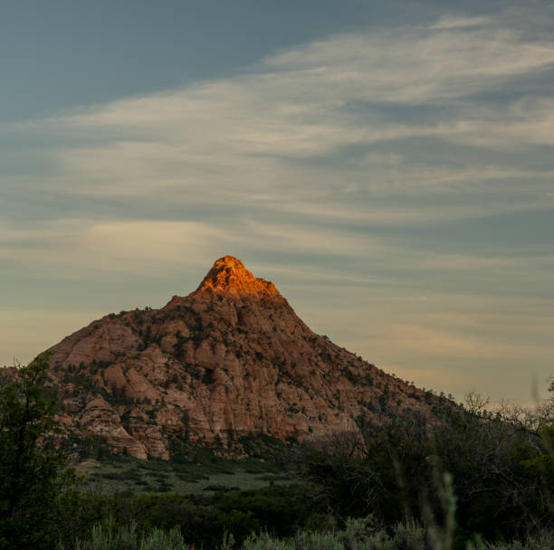 Tip Of Red Butte Glows With Evening Light In Zion National Park
