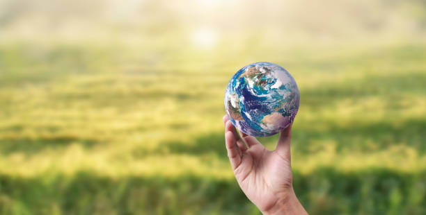 istock Globe ,earth in human hand, holding. Earth image provided by Nasa 2085071201