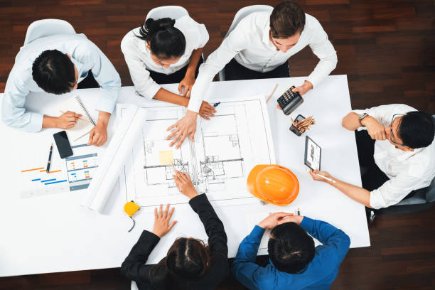 istock Diverse group of civil engineer and client working on architect. Prudent 2085085578