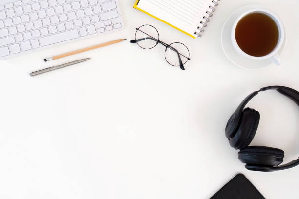 istock Top view keyboard and coffee cup on office desk. Copy space for your text 2085128924