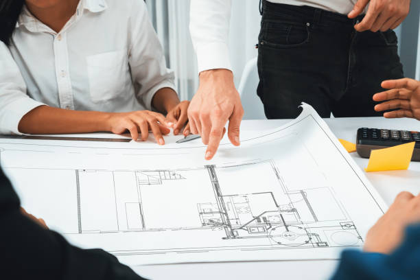 istock Diverse group of civil engineer and client working on architect. Prudent 2085133547