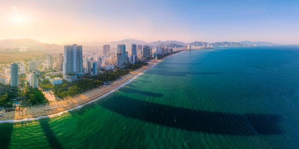Drone view Nha Trang beach of Nha Trang city in golden hour - Khanh Hoa province, central Vietnam