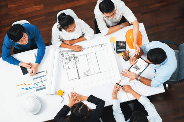 istock Diverse group of civil engineer and client working on architect. Prudent 2085148139