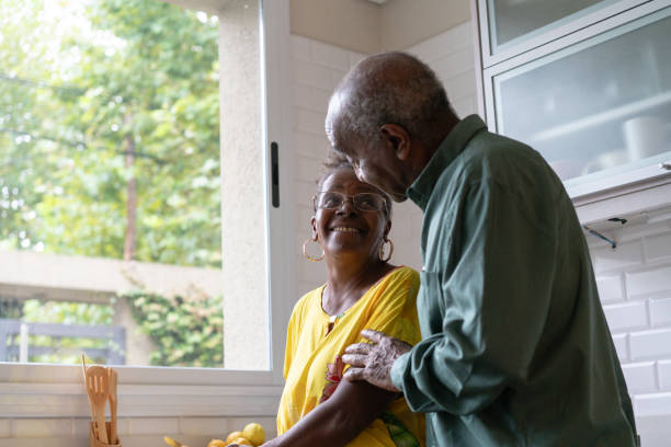 istock Happy  black senior couple cooking 2085153361