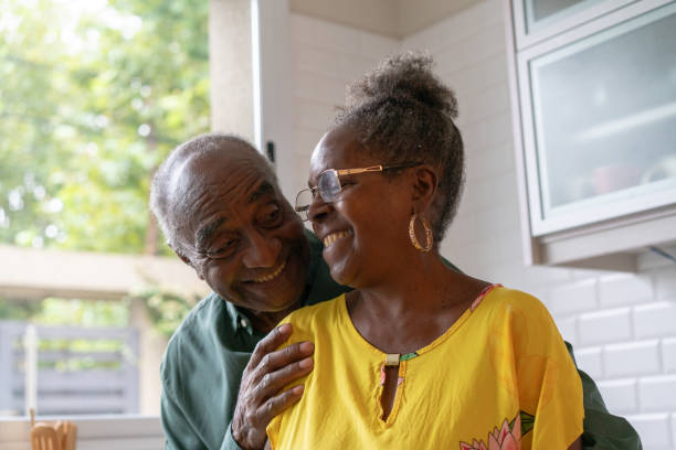 istock Happy black senior couple looking each other 2085153869