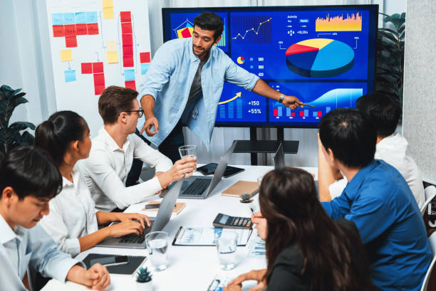 istock Presentation in office or meeting room with analyst team. Prudent 2085166304
