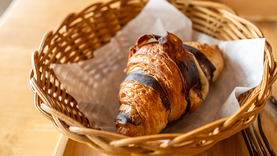 croissant in bamboo basket