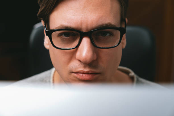 istock Portrait stressful businessman in dark light on creative planner. Pecuniary. 2085188913