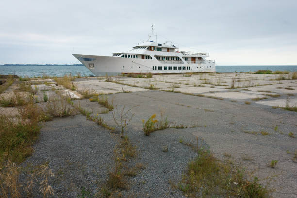 Old passenger boat moored on a spooky abandoned dock