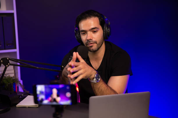 istock Broadcaster talking to listener on live streaming, recording phone. Surmise. 2085246148