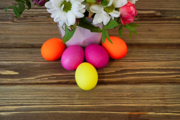 Happy easter! Flat Lay, Internet banner, postcard on Easter.  Bouquet of flowers and Easter eggs