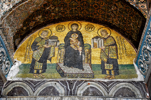 Istanbul - May 25, 2013: Wall mosaic image of Jesus Christ inside old Hagia Sophia or Ayasofya, Turkey. Ancient Eastern Orthodox and Byzantine art. Famous Hagia Sophia mosque is top landmark of city.